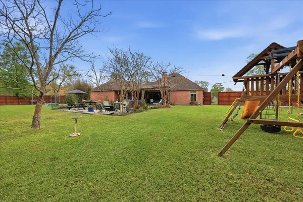 a view of a house with a park