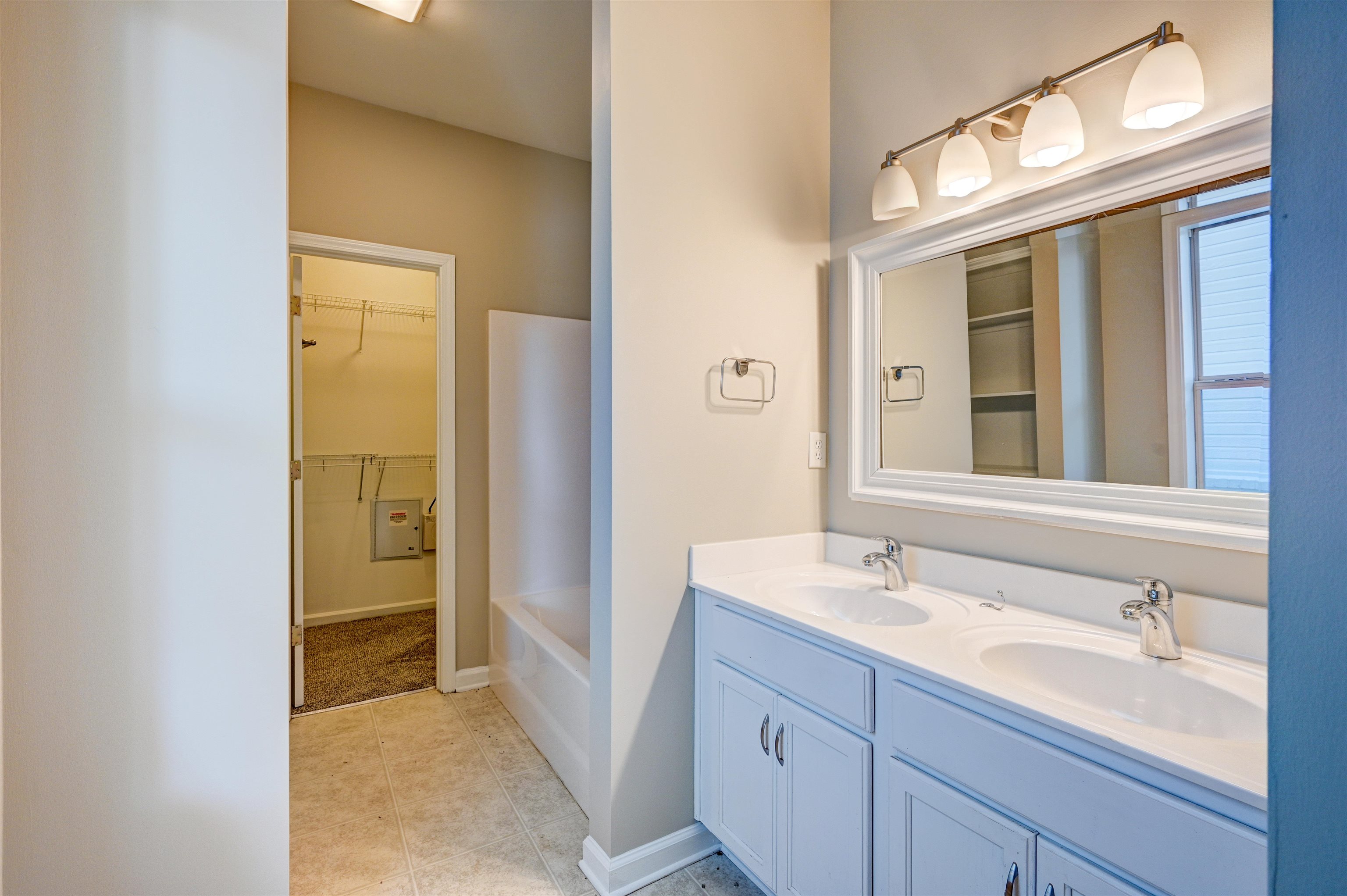 1355 Island Ridge Drive Memphis, TN 38103 - Photo 11 of 21 a bathroom with a sink and a mirror