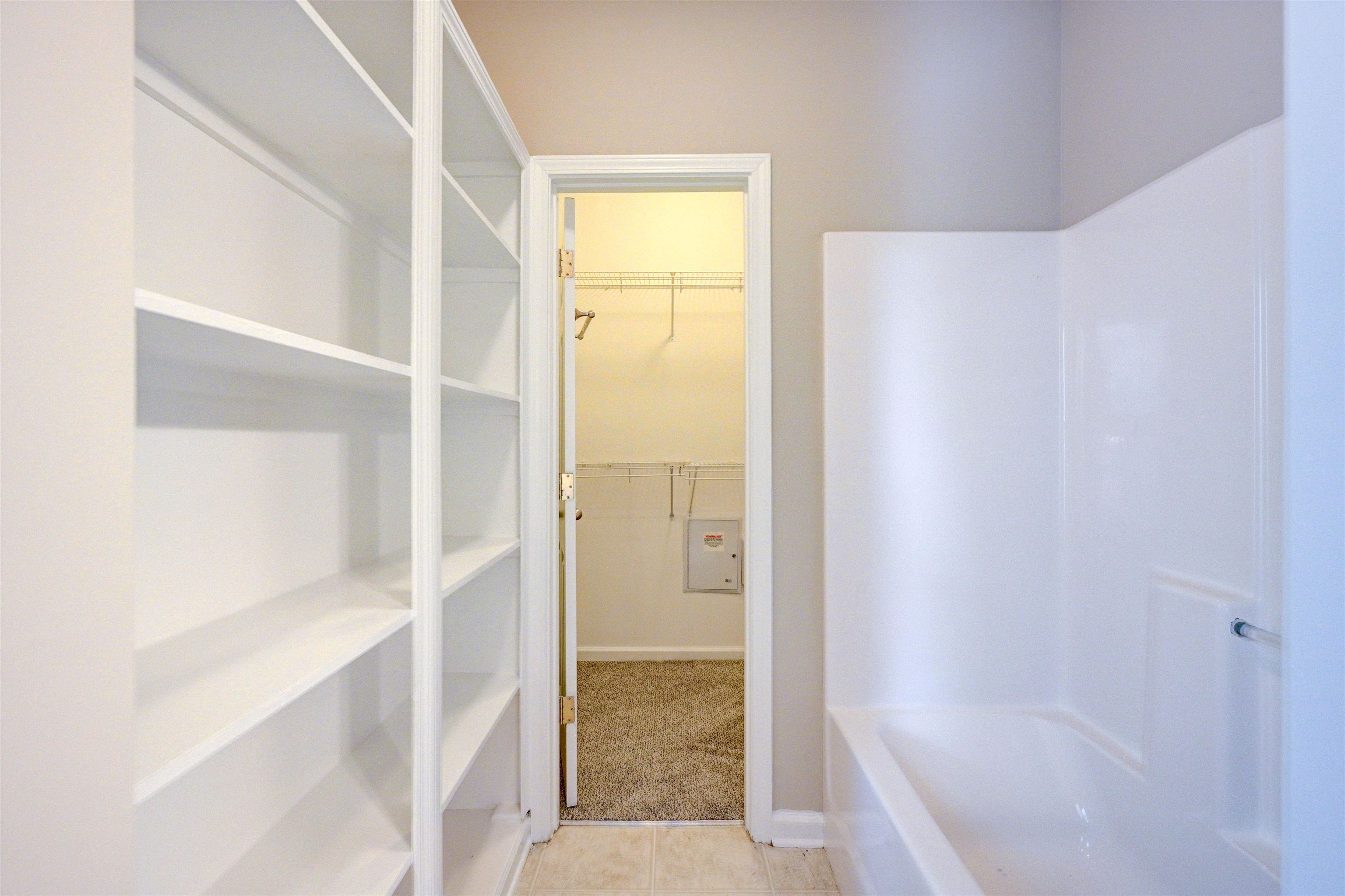 1355 Island Ridge Drive Memphis, TN 38103 - Photo 13 of 21 a bathroom with a tub and shower