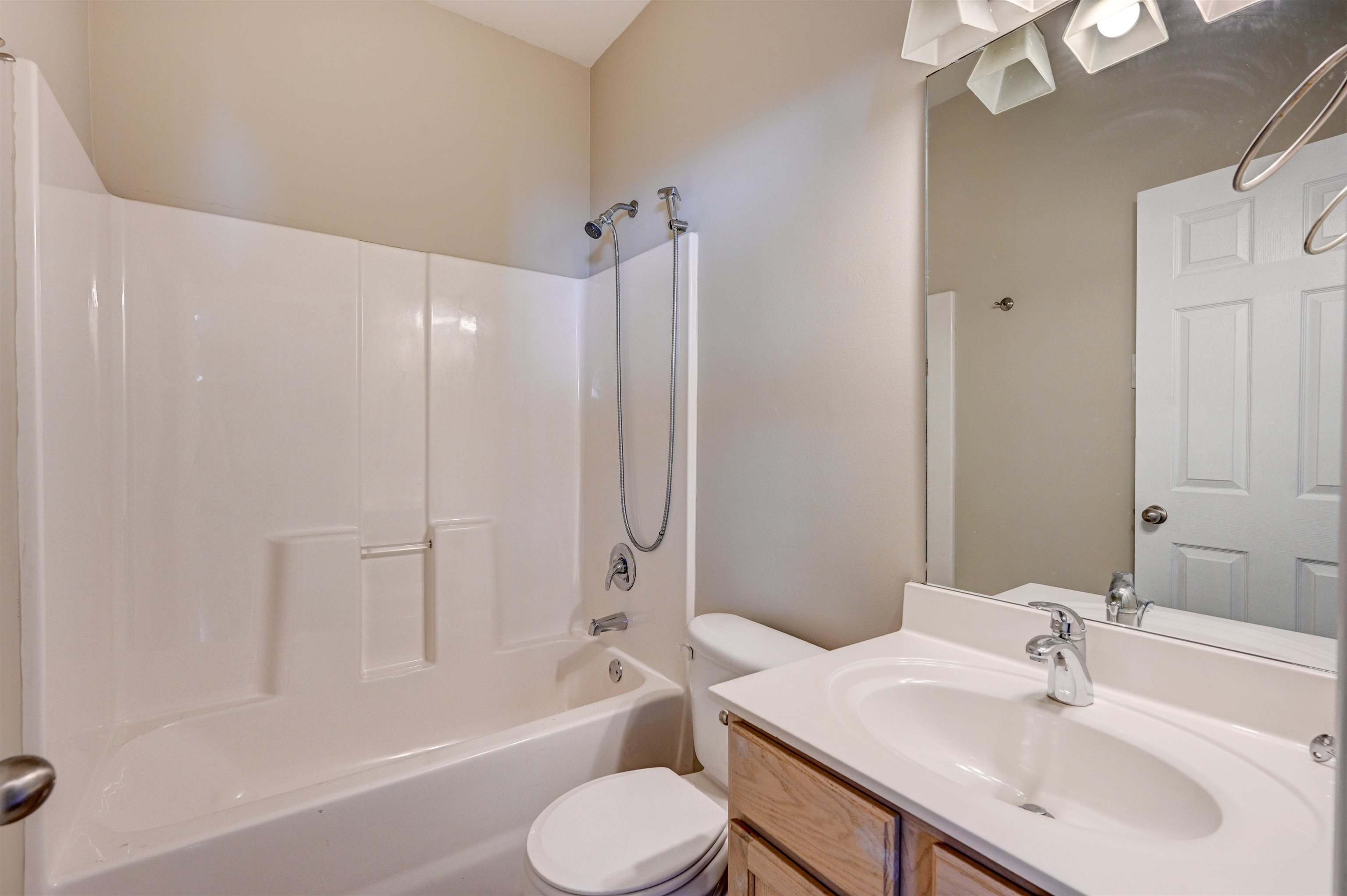 1355 Island Ridge Drive Memphis, TN 38103 - Photo 16 of 21 a bathroom with a sink toilet and shower