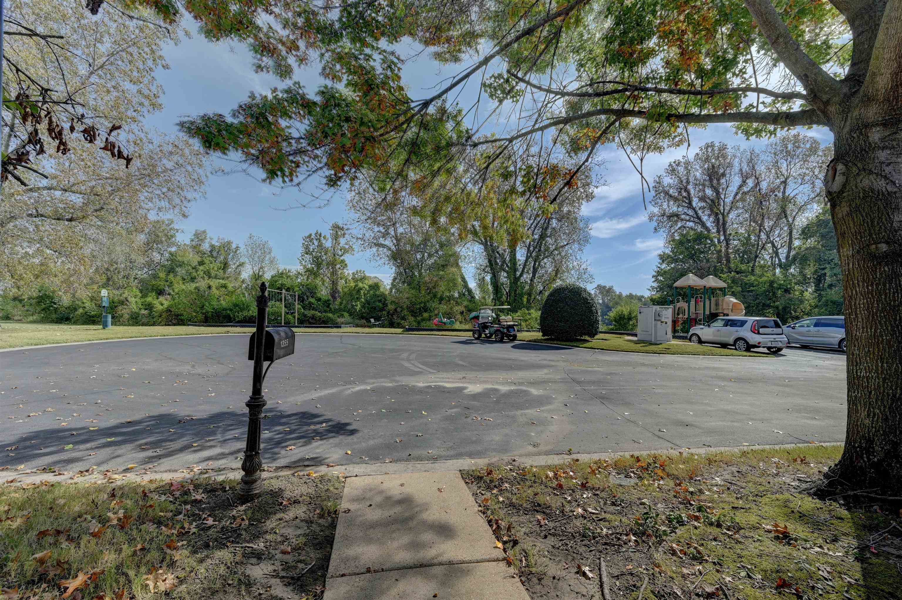 1355 Island Ridge Drive Memphis, TN 38103 - Photo 17 of 21 a street view with large trees