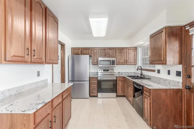 $405,000 | 8752 East Amherst Drive, Unit E, Denver, CO 80231