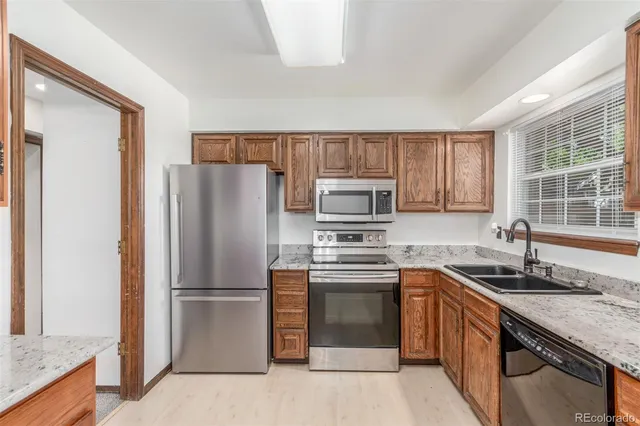 $405,000 | 8752 East Amherst Drive, Unit E, Denver, CO 80231