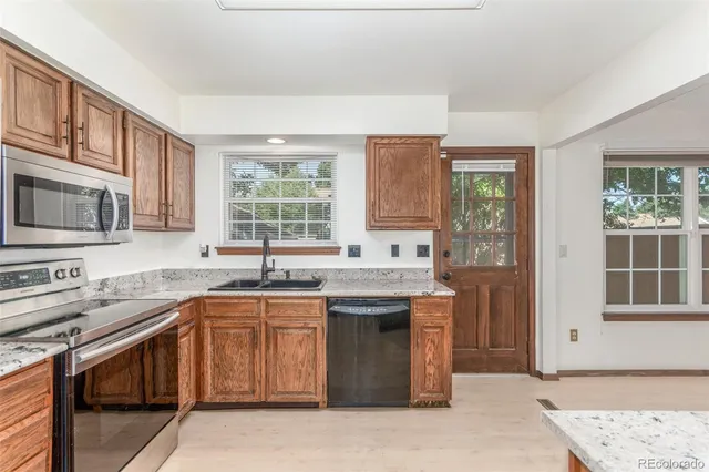 $405,000 | 8752 East Amherst Drive, Unit E, Denver, CO 80231