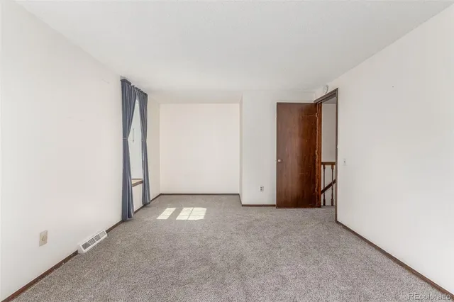 $405,000 | 8752 East Amherst Drive, Unit E, Denver, CO 80231