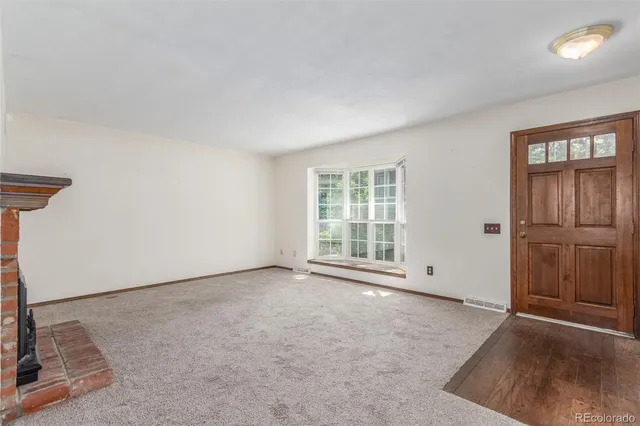 an empty room with windows