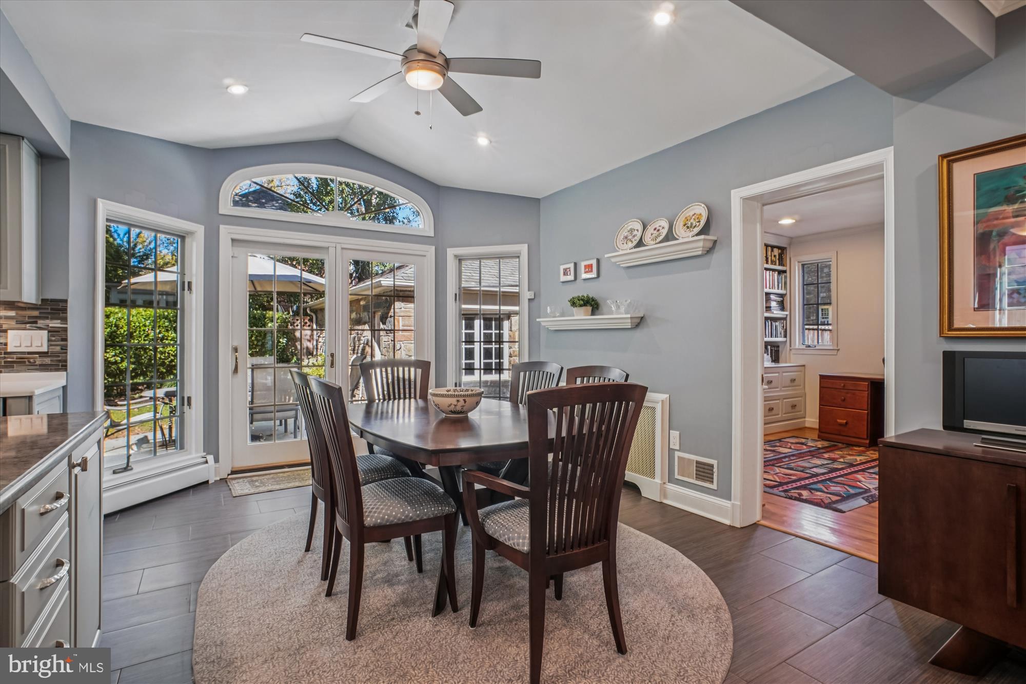 5103 Fairglen Lane Chevy Chase, MD 20815 - Photo 11 of 41 a view of a dining room with furniture window and wooden floor