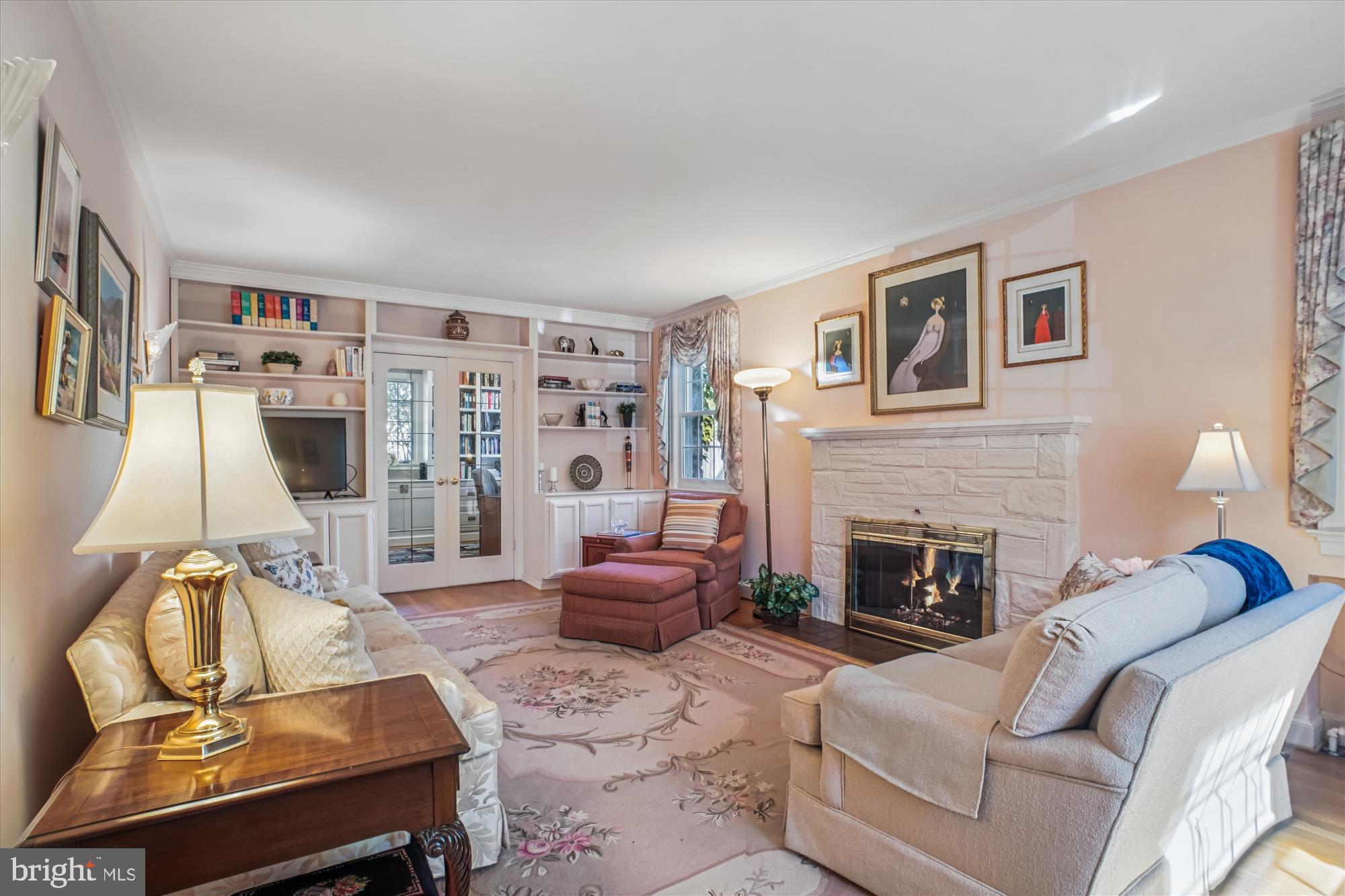 5103 Fairglen Lane Chevy Chase, MD 20815 - Photo 14 of 41 a living room with furniture and a fireplace