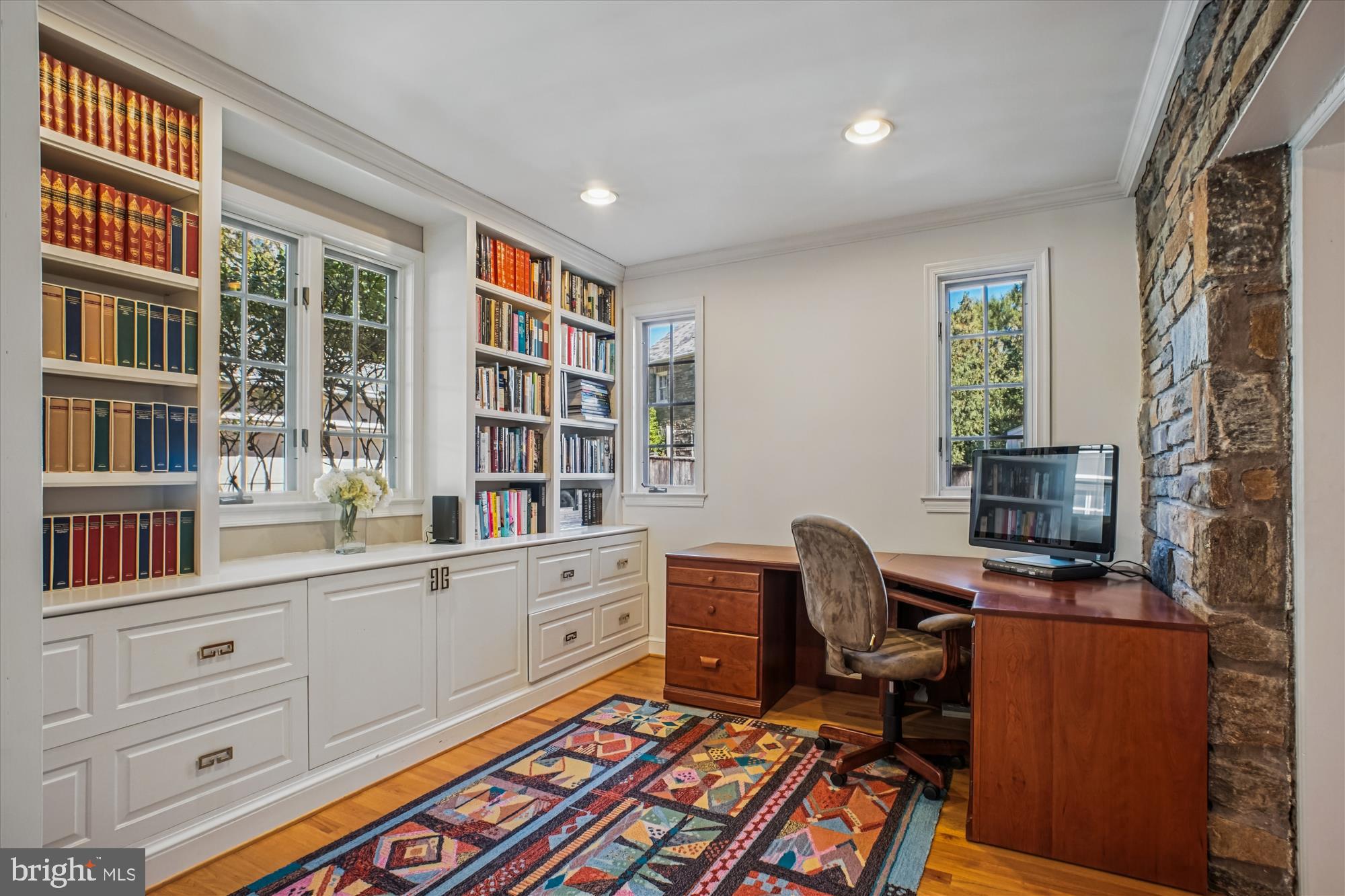 5103 Fairglen Lane Chevy Chase, MD 20815 - Photo 15 of 41 a work room with furniture windows and book shelf