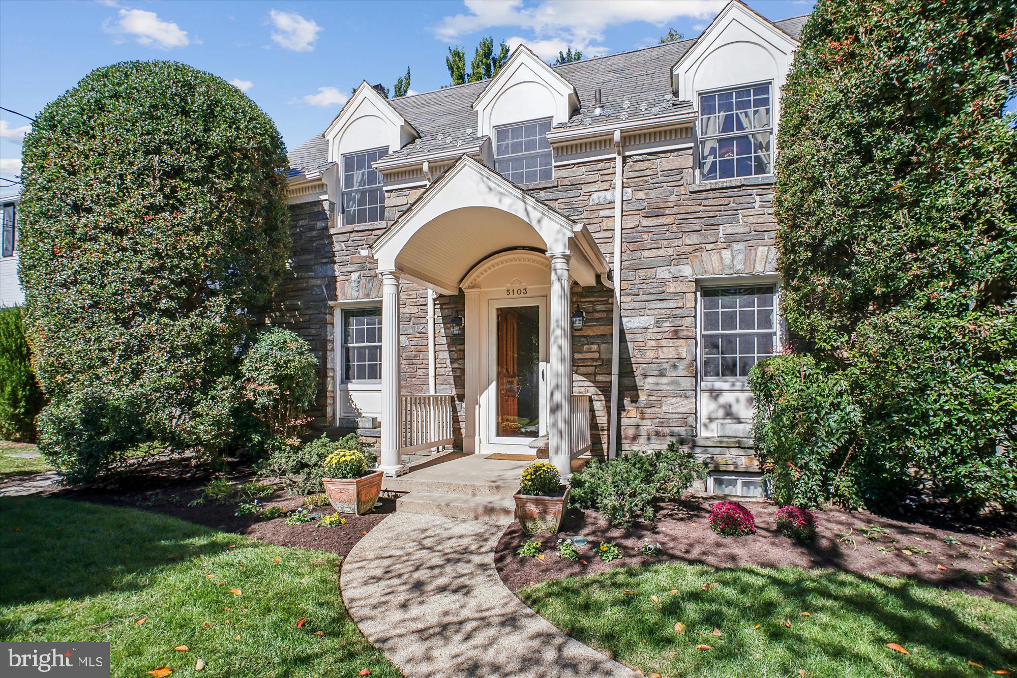 5103 Fairglen Lane Chevy Chase, MD 20815 - Photo 2 of 41 a front view of a house with a yard