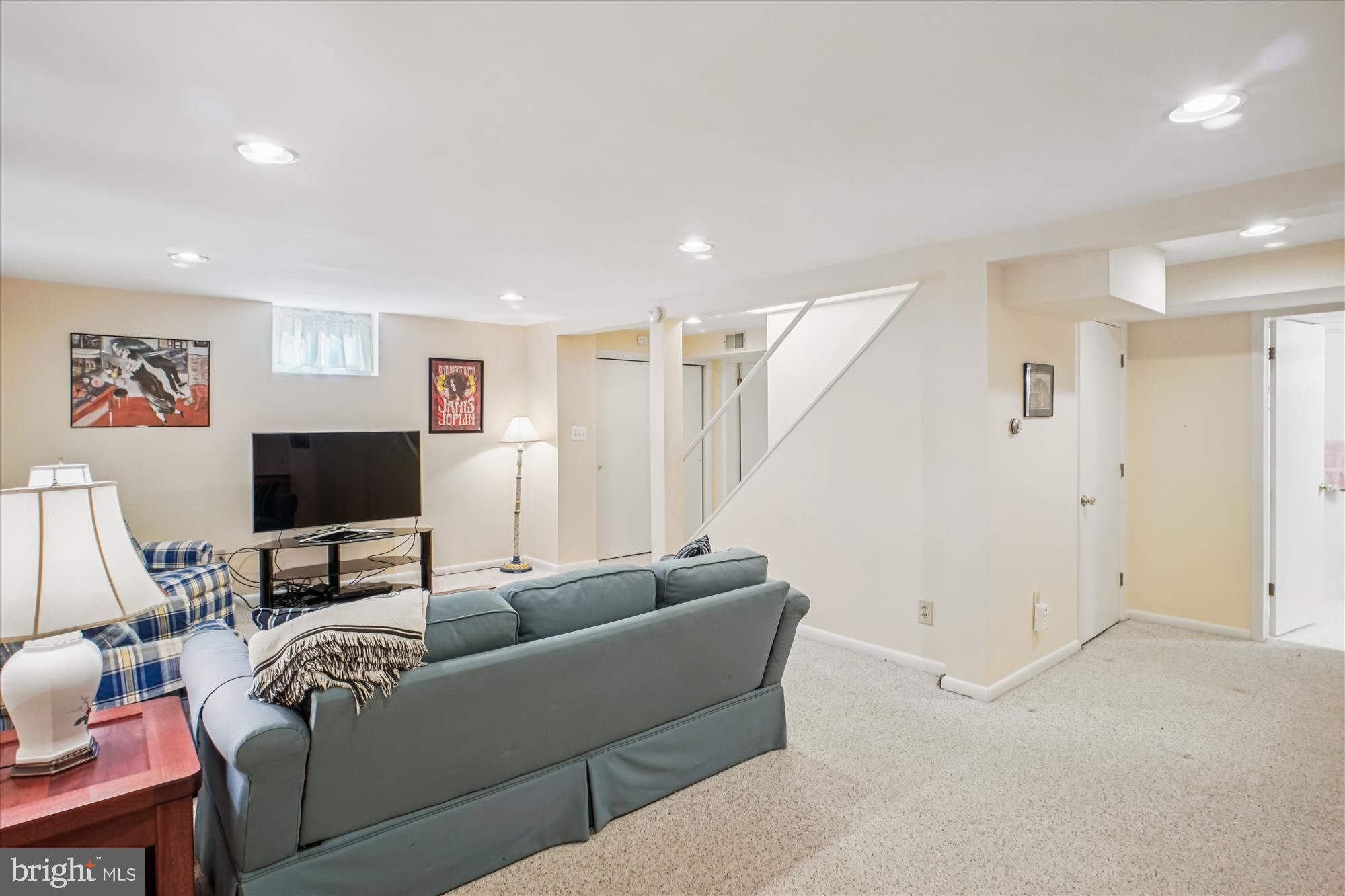 5103 Fairglen Lane Chevy Chase, MD 20815 - Photo 23 of 41 a living room with furniture and a flat screen tv