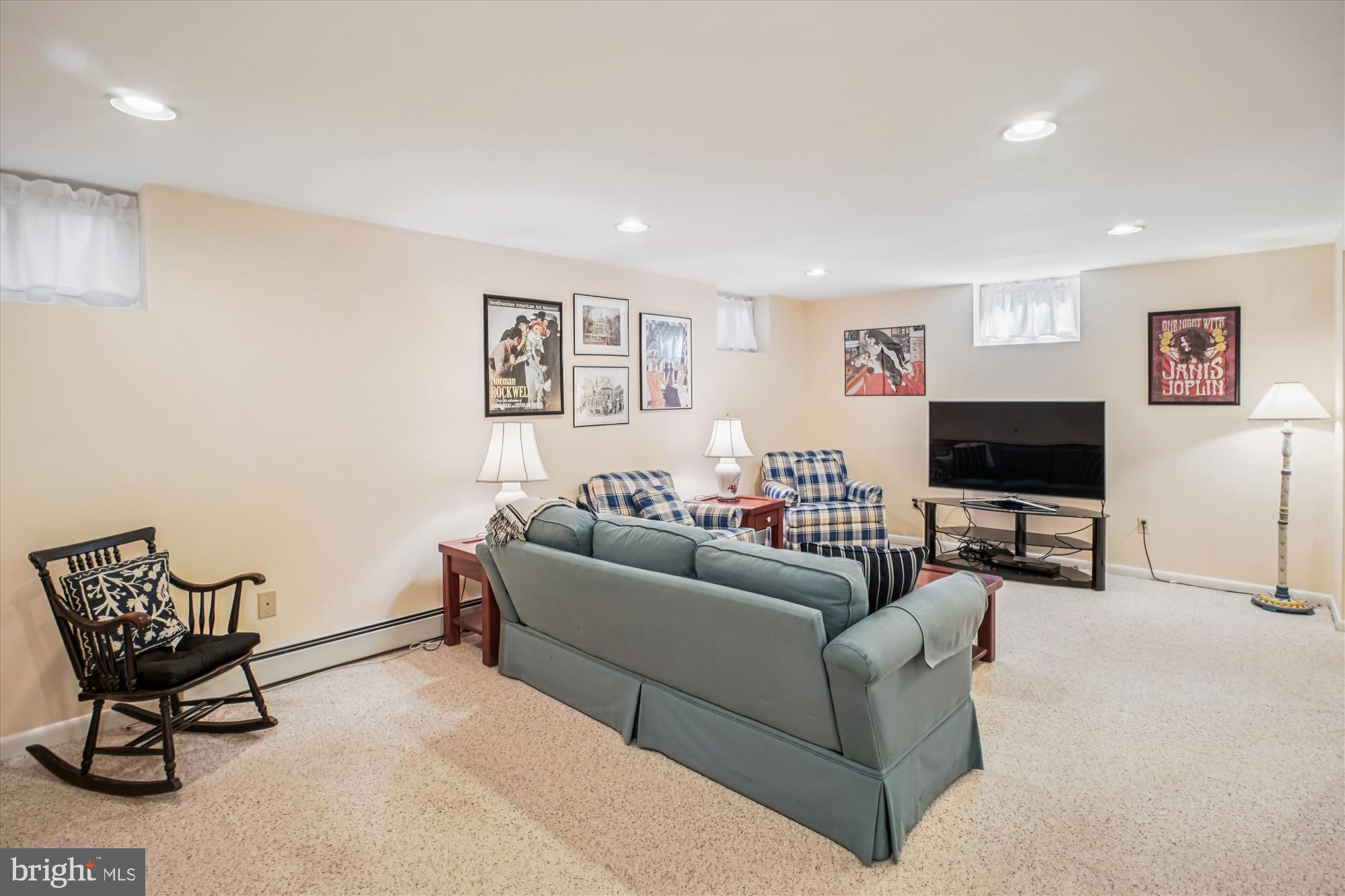 5103 Fairglen Lane Chevy Chase, MD 20815 - Photo 24 of 41 a living room with furniture and a flat screen tv