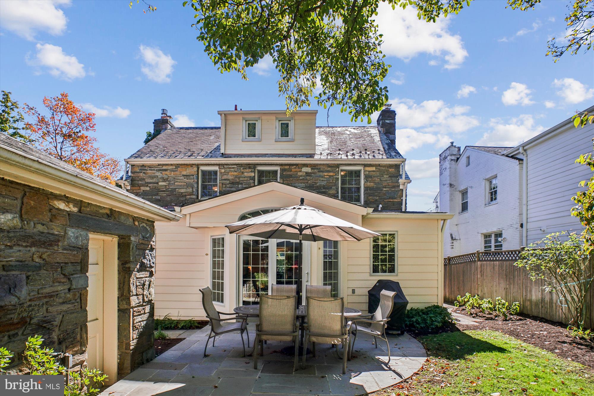5103 Fairglen Lane Chevy Chase, MD 20815 - Photo 29 of 41 a front view of a house with a yard
