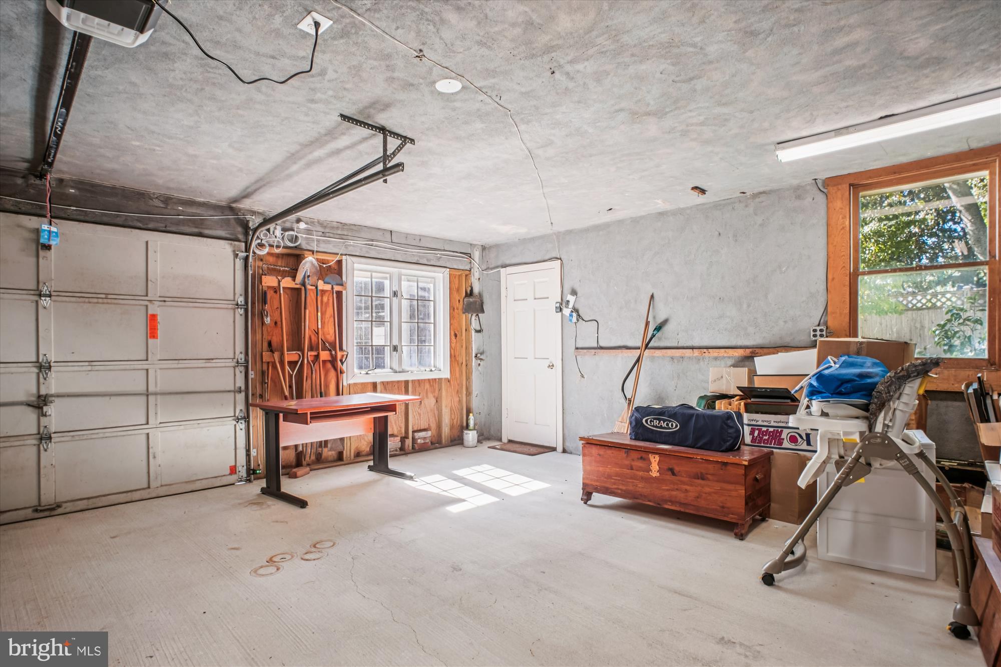 5103 Fairglen Lane Chevy Chase, MD 20815 - Photo 32 of 41 a bedroom with furniture and a window