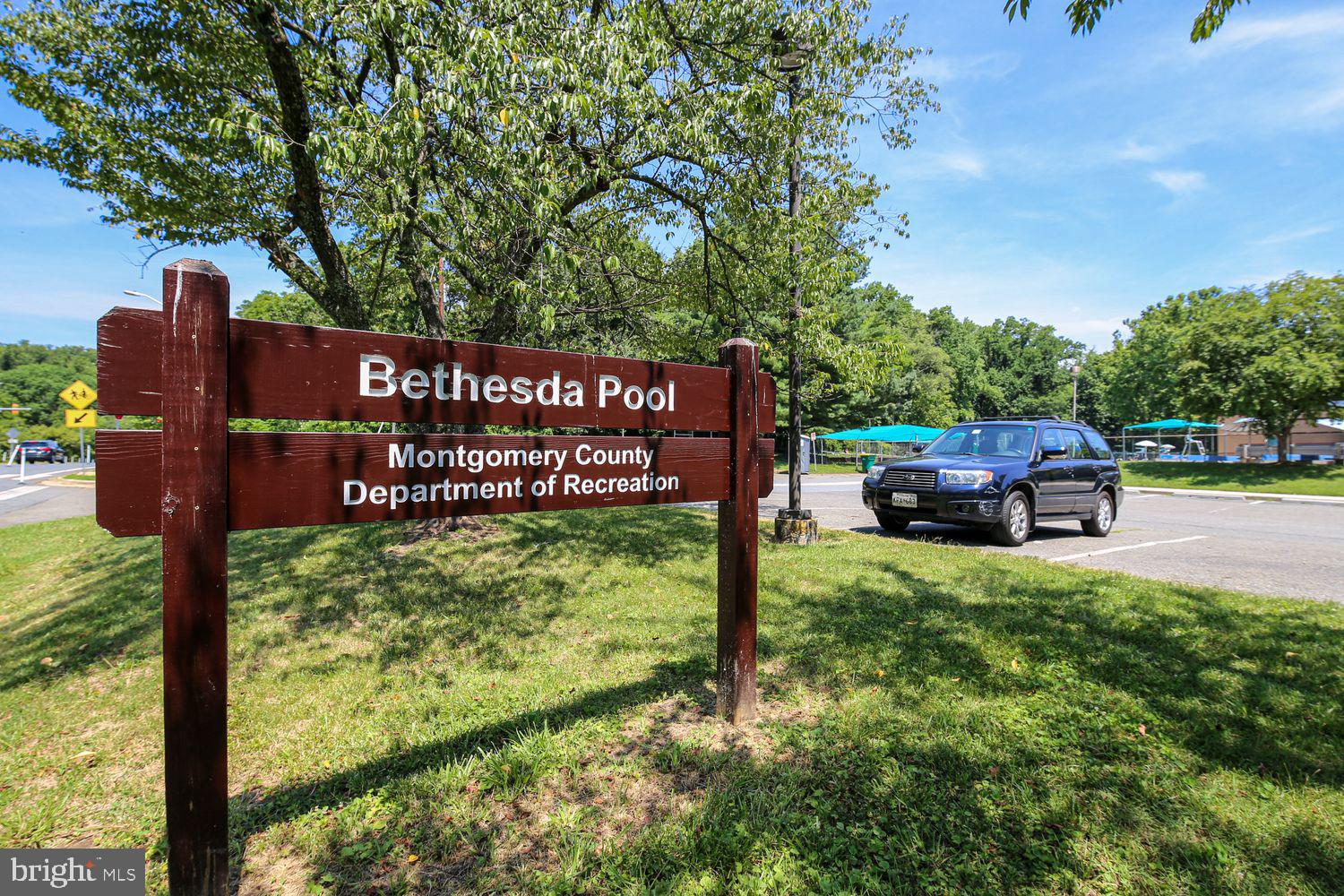 5103 Fairglen Lane Chevy Chase, MD 20815 - Photo 36 of 41 a view of a park that has sign board