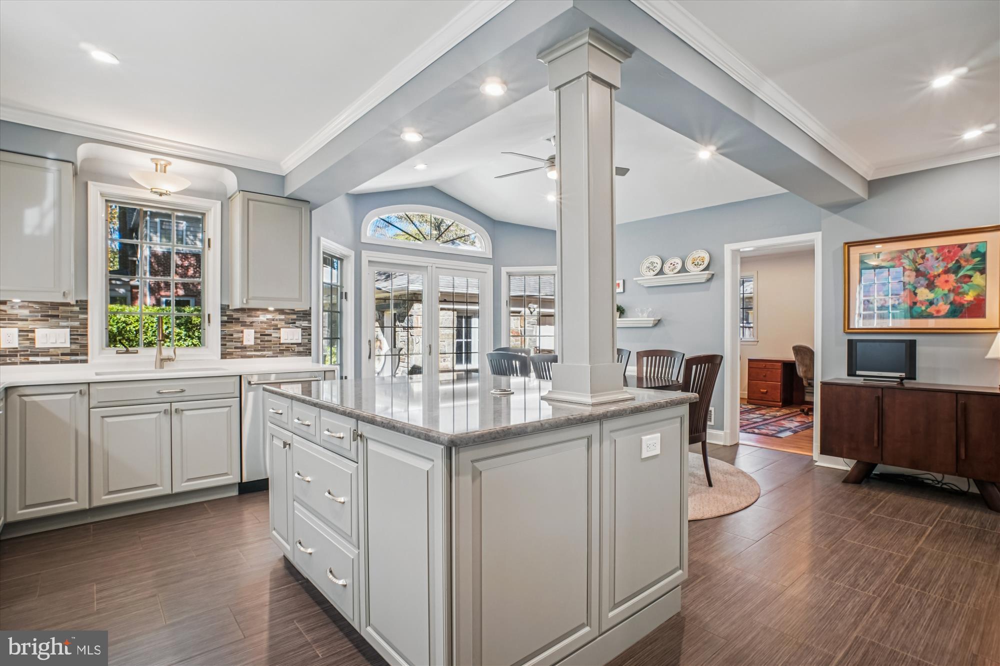5103 Fairglen Lane Chevy Chase, MD 20815 - Photo 6 of 41 a kitchen with center island and windows