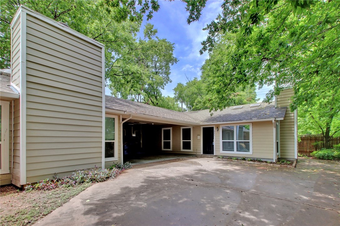 608 Genard Street, Unit B Austin, TX 78751 - Photo 1 of 1 a view of a house with a yard and potted plants