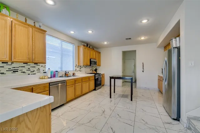 $599,999 | 5842 Pueblo Canyon Avenue, Las Vegas, NV 89131