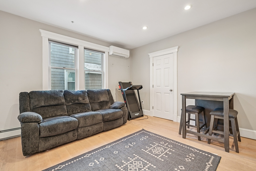 600 Shirley Street, Unit 4 Winthrop, MA 02152 - Photo 7 of 29 a living room with furniture and a window