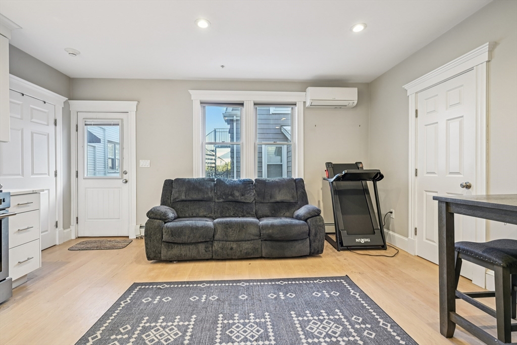 600 Shirley Street, Unit 4 Winthrop, MA 02152 - Photo 8 of 29 a living room with furniture and a window