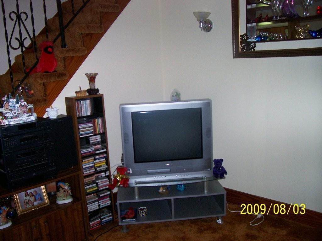 1070 Middle Road Clarksburg, MA 01247 - Photo 8 of 8 a living room with furniture and a flat screen tv