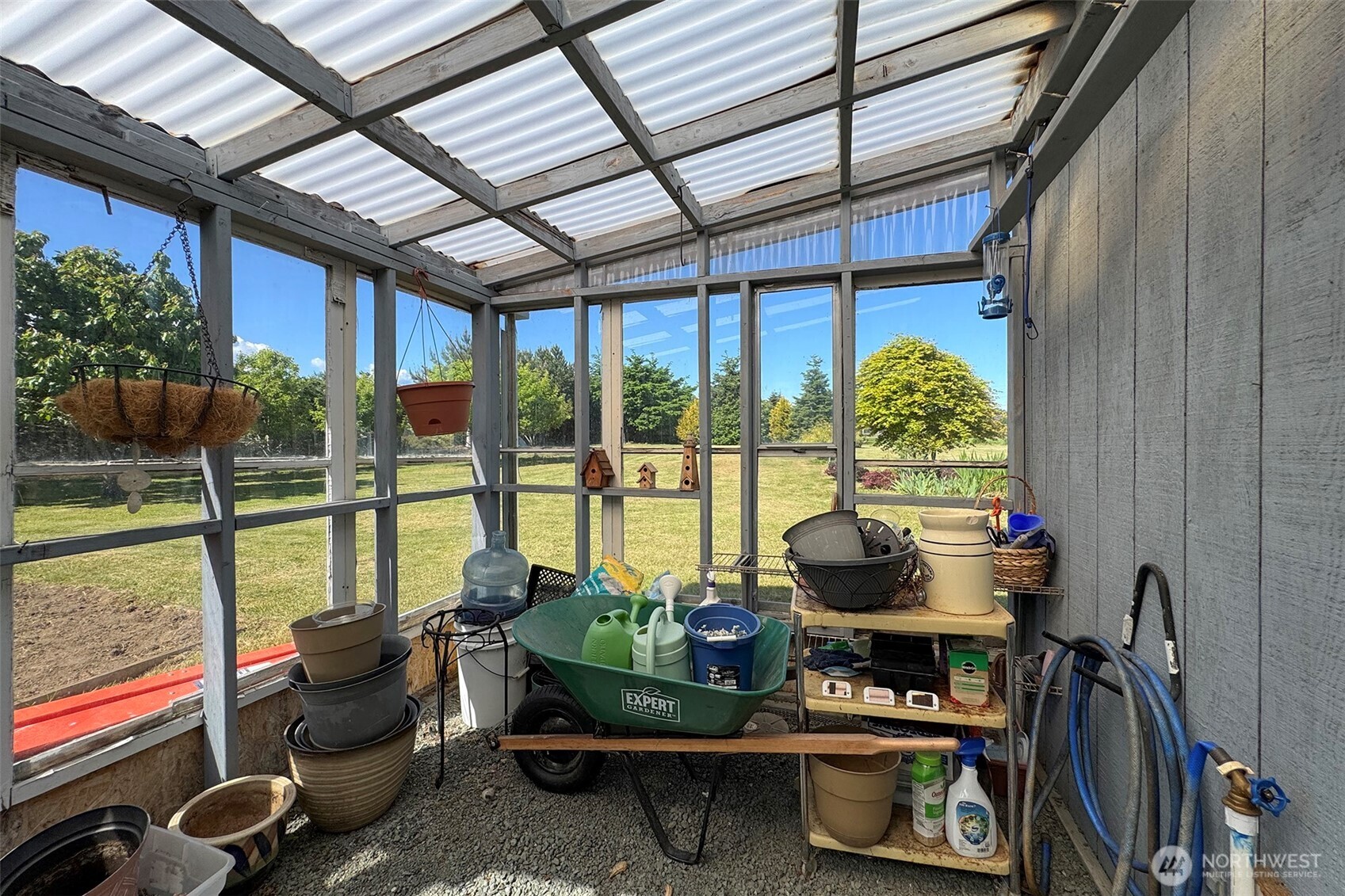 101 Timothy Lane Sequim, WA 98382 - Photo 33 of 39 a room with furniture and a floor to ceiling window