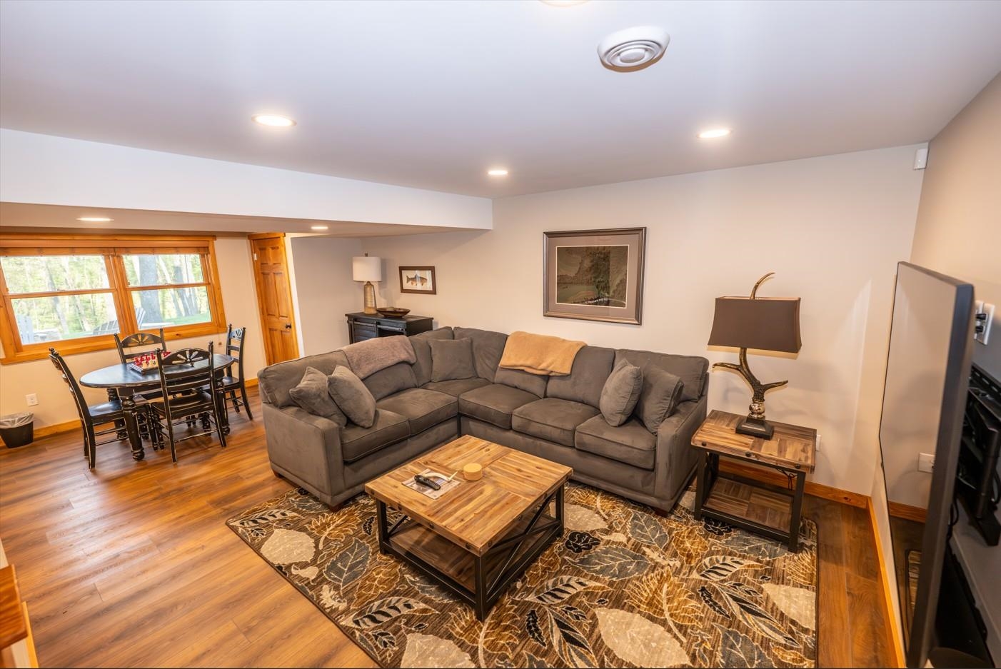 5829 South Pleasant Hill Road Elizabeth, IL 61028 - Photo 19 of 68 a living room with furniture and a flat screen tv