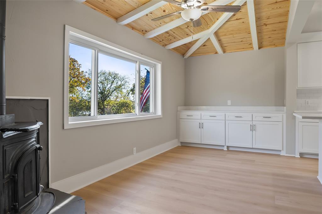 308 Country Club Road Argyle, TX 76226 - Photo 15 of 37 a view of a livingroom with an empty space and a window