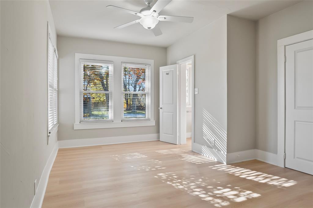 308 Country Club Road Argyle, TX 76226 - Photo 22 of 37 a view of a livingroom with a ceiling fan and window