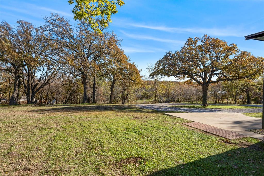 308 Country Club Road Argyle, TX 76226 - Photo 34 of 37 a view of an outdoor space and a yard