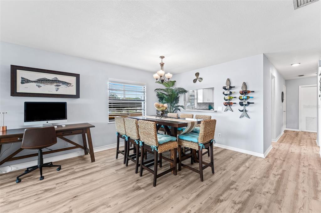 29 Pelican Lane Edgewater, FL 32141 - Photo 5 of 39 a view of a dining room with furniture and wooden floor