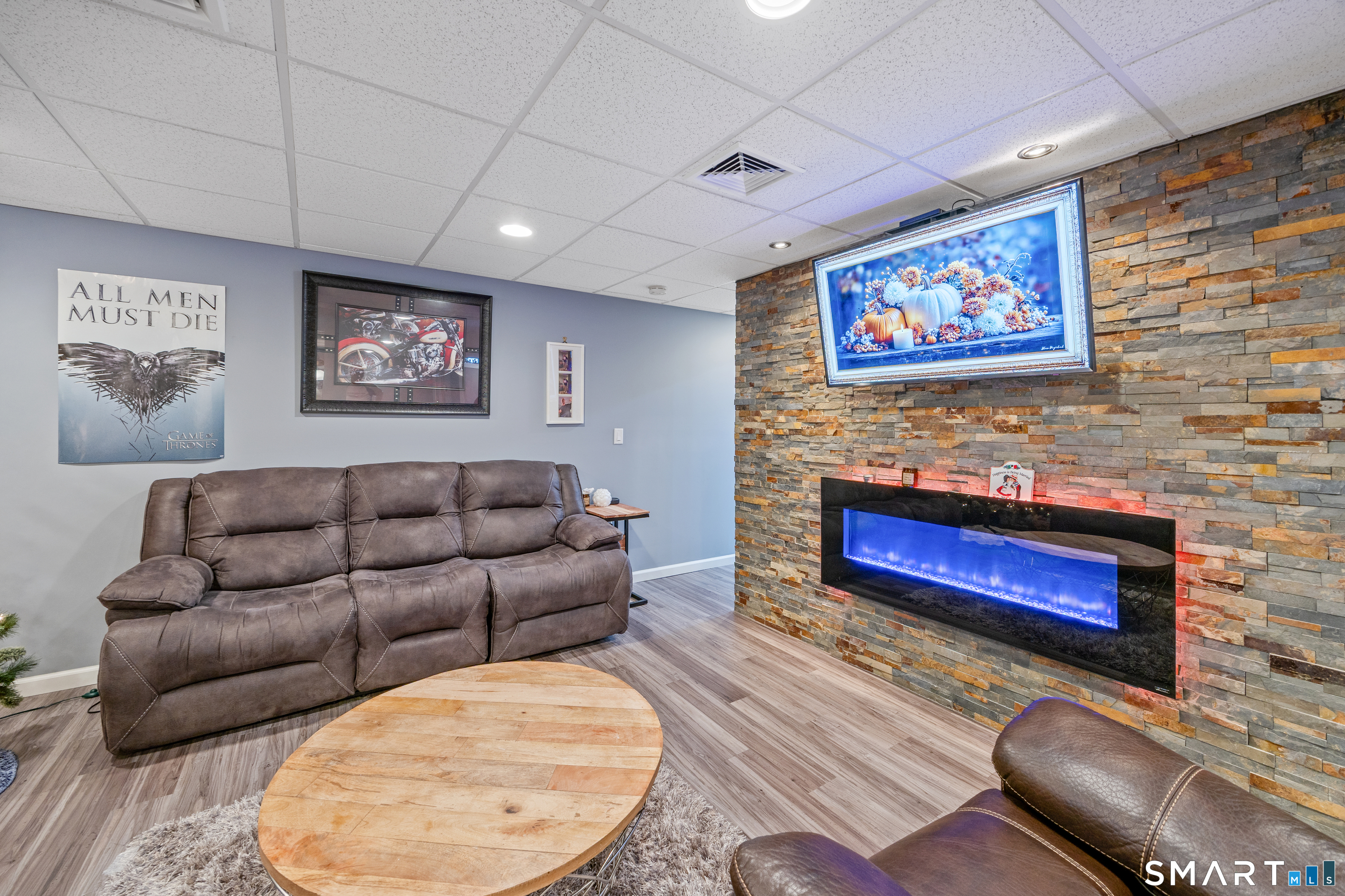 3 Ellen Lane Thomaston, CT 06787 - Photo 31 of 40 a living room with furniture and a flat screen tv