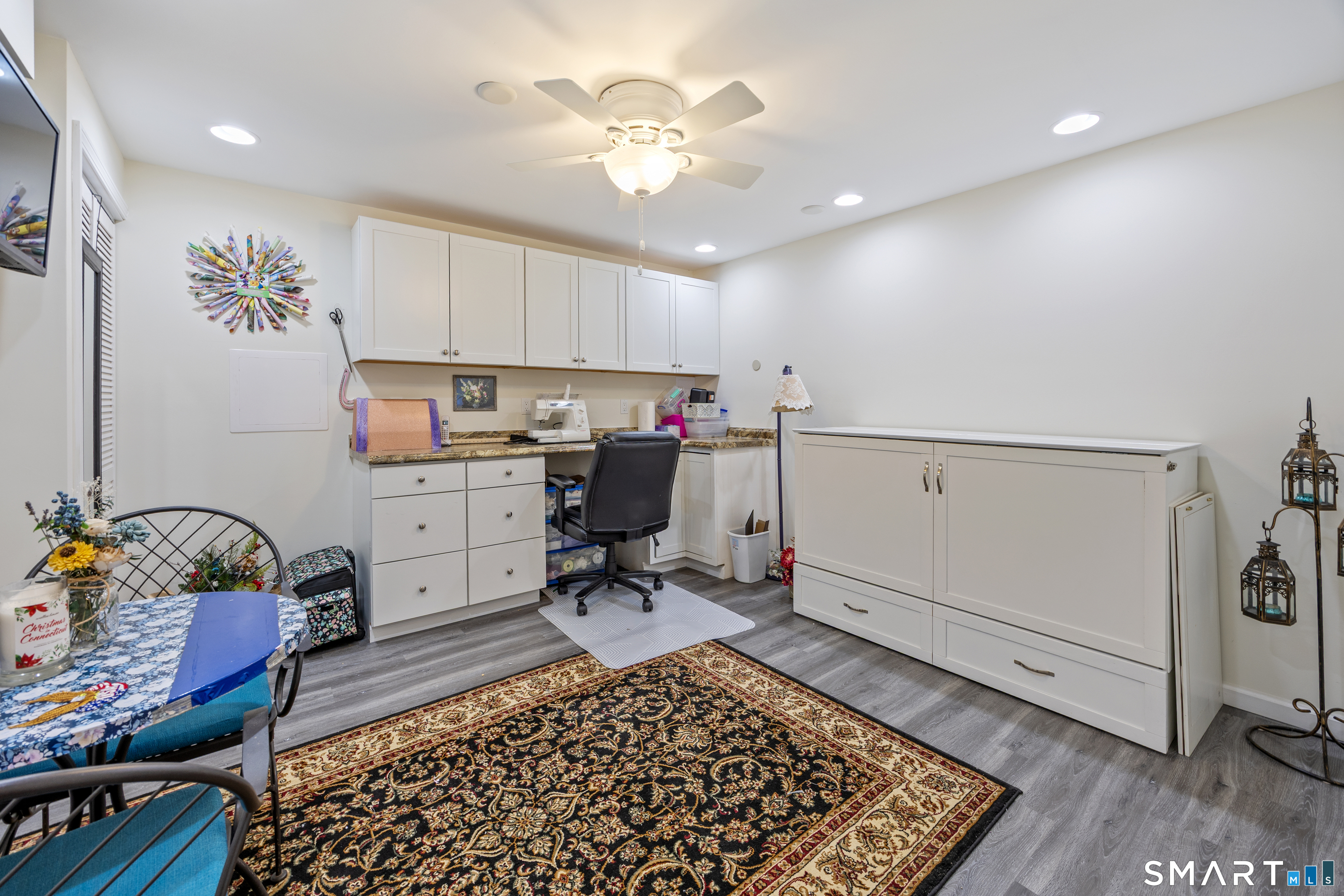 3 Ellen Lane Thomaston, CT 06787 - Photo 34 of 40 a view of a workspace with furniture and a rug