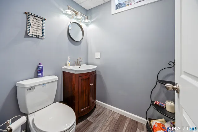 a view of a house with wooden fence