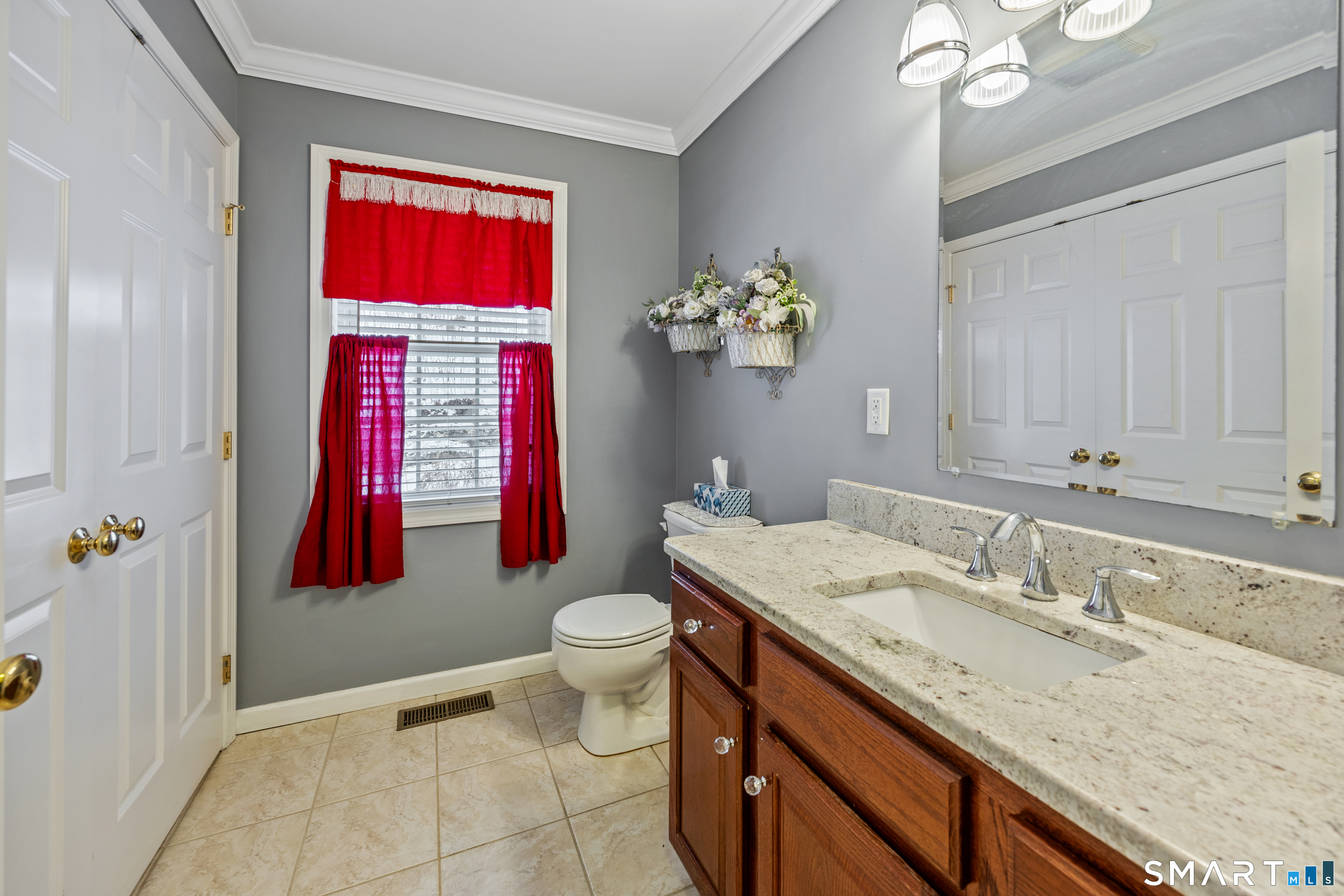 3 Ellen Lane Thomaston, CT 06787 - Photo 5 of 40 a bathroom with a granite countertop sink a toilet and shower