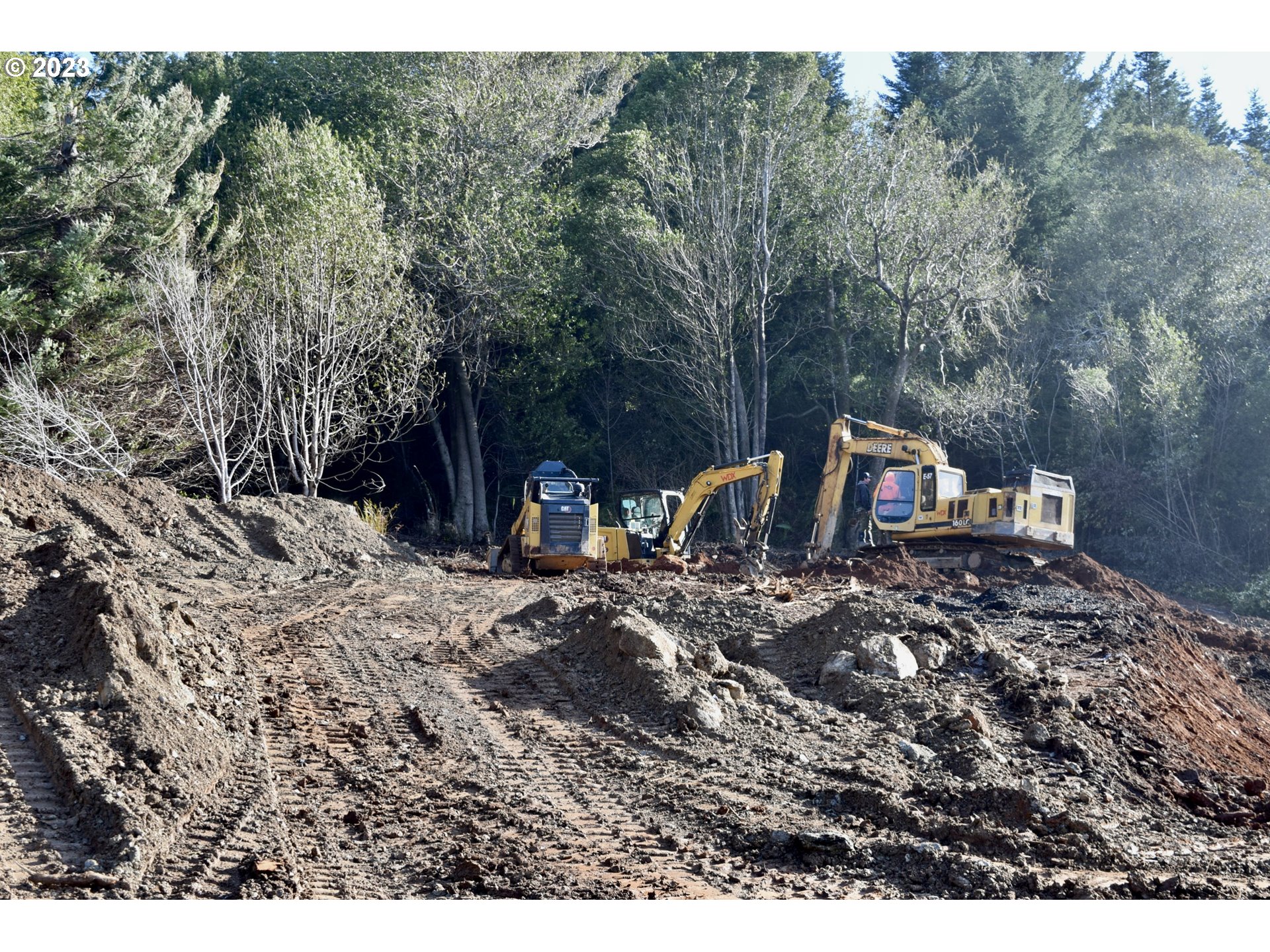 Skyview, Unit 101 Gold Beach, OR 97444 - Photo 16 of 16 a view of a outdoor space with trees
