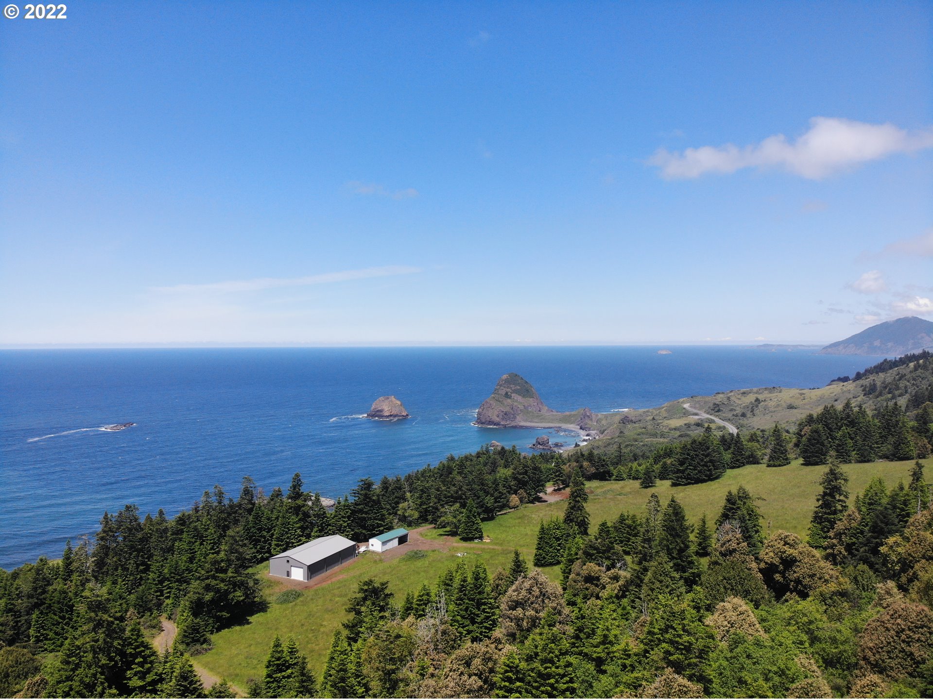 Skyview, Unit 101 Gold Beach, OR 97444 - Photo 7 of 16 an aerial view of a city
