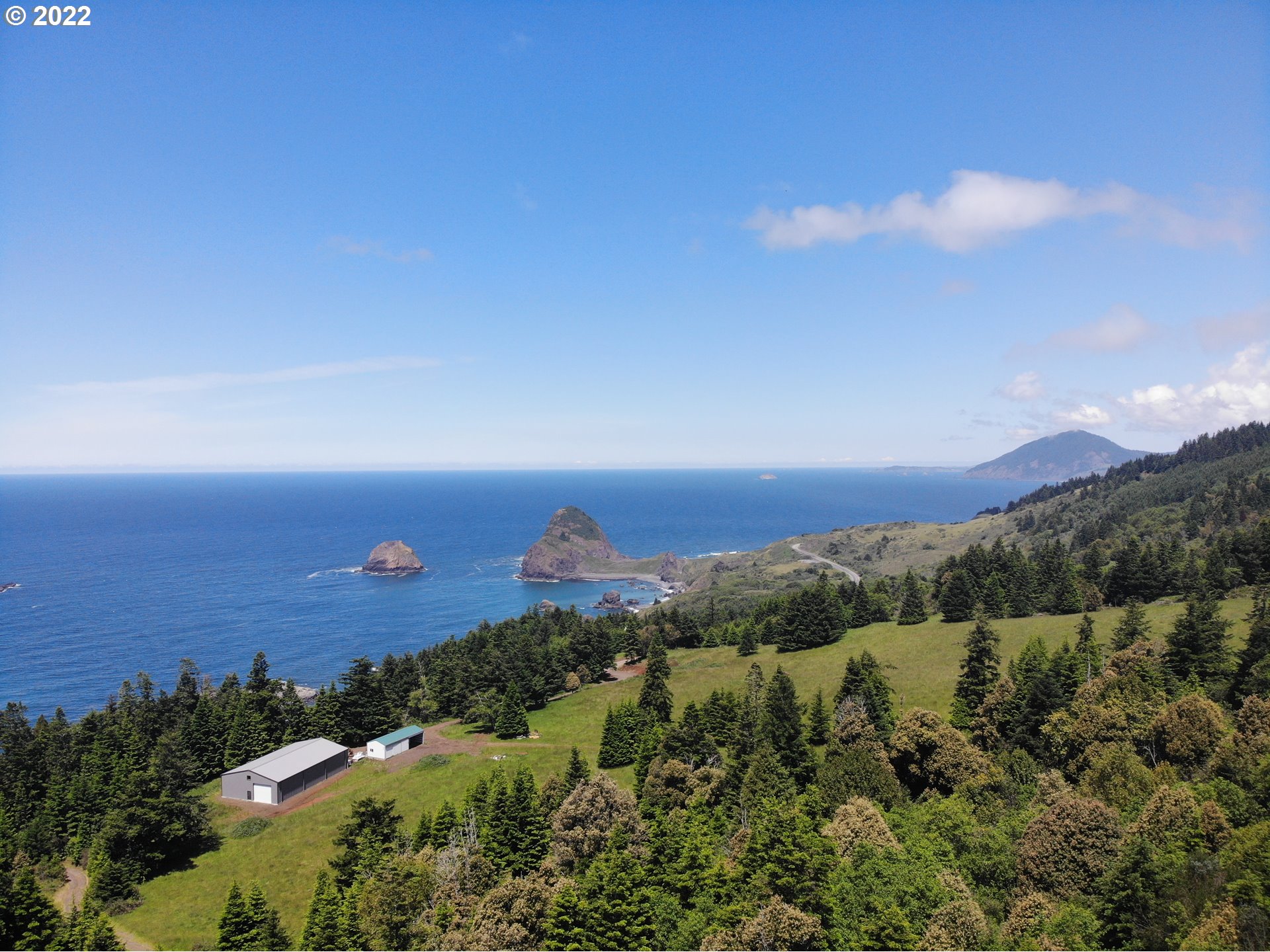 Skyview, Unit 101 Gold Beach, OR 97444 - Photo 8 of 16 an aerial view of a city