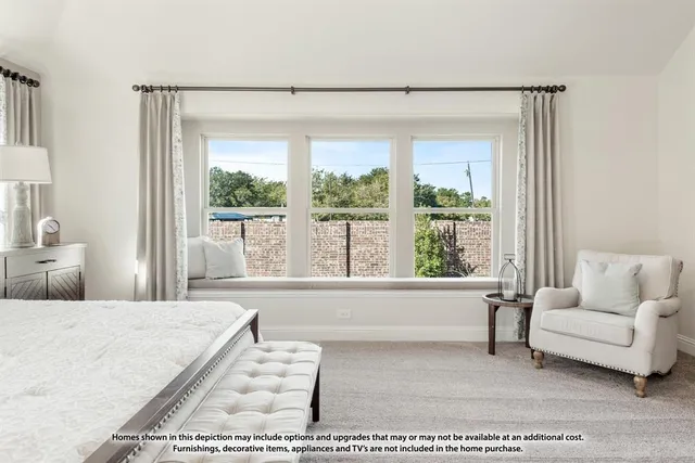 a bathroom with a double vanity sink a mirror and a bathtub