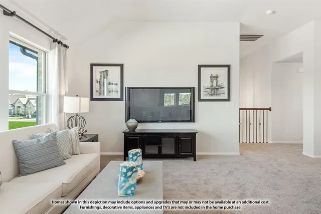 a living room with furniture a wooden floor and a sink