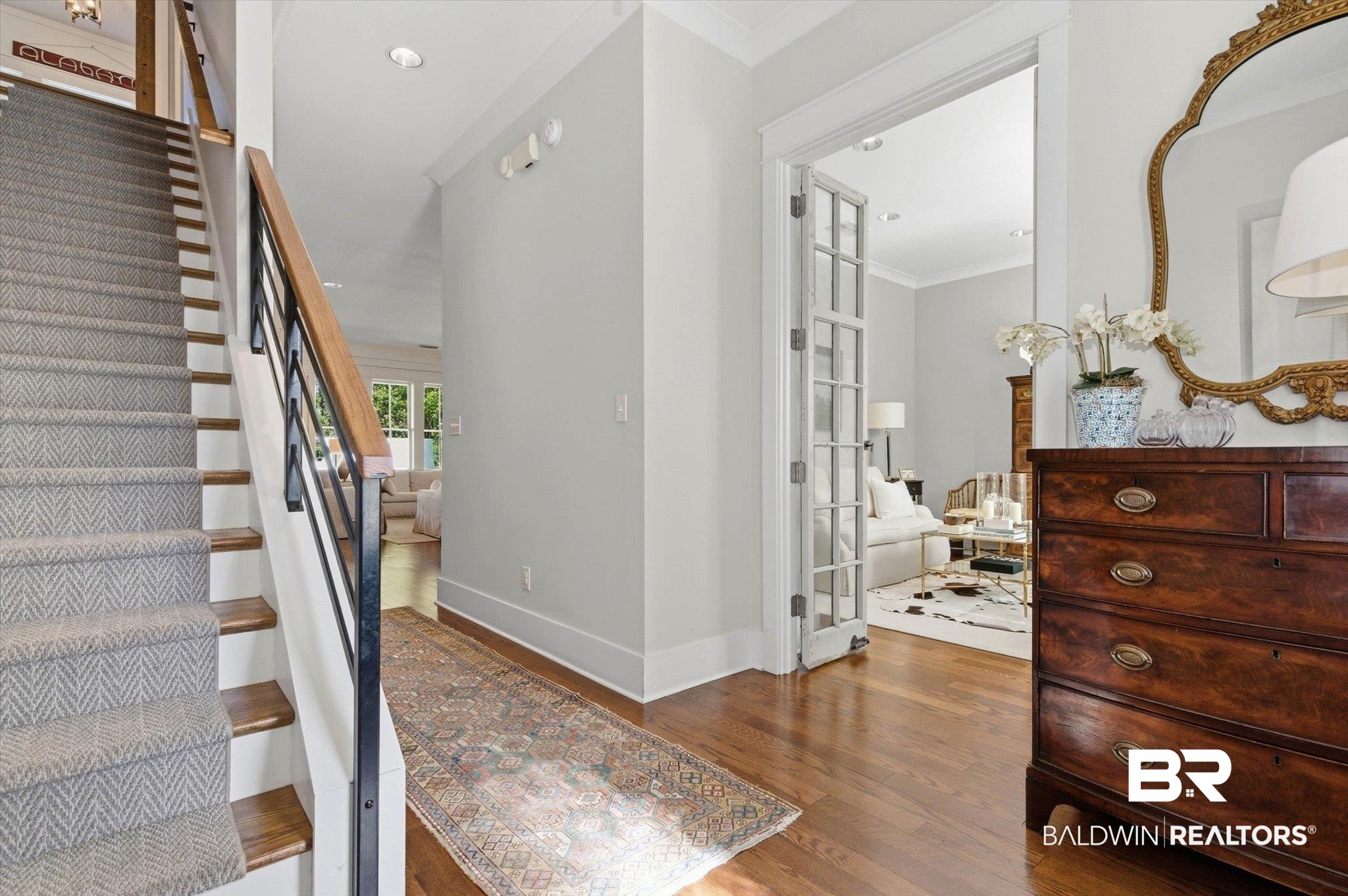 3704 Stein Street Mobile, AL 36608 - Photo 3 of 37 Stairway featuring wood finished floors, ornamental molding, and french doors