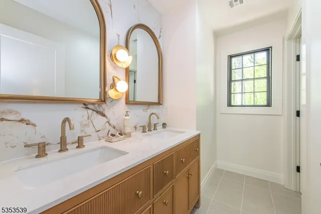 a bathroom with a toilet a sink and bathtub