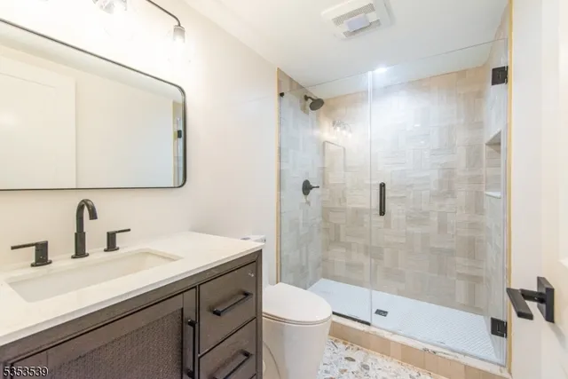 a view of a balcony with wooden floor