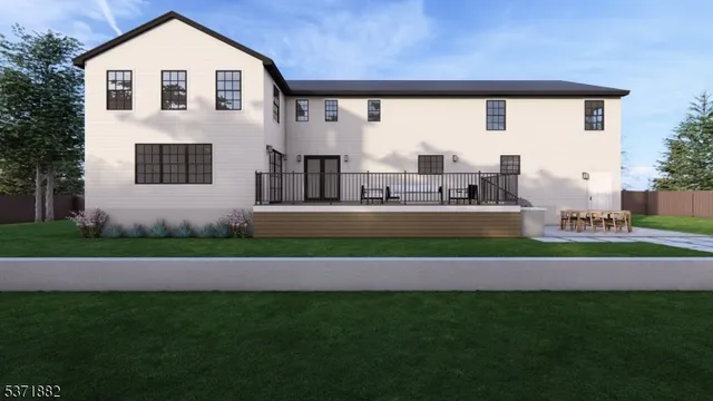 a view of an house with backyard space and balcony