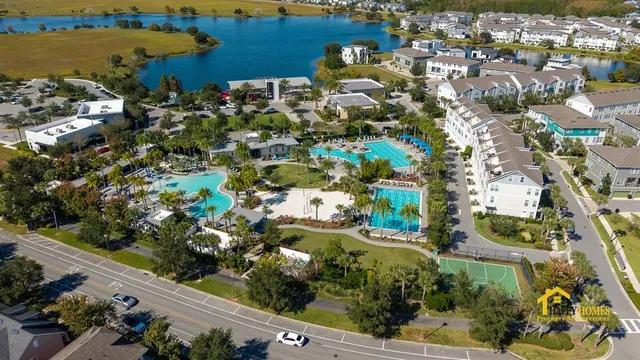 a view of swimming pool with outdoor seating space
