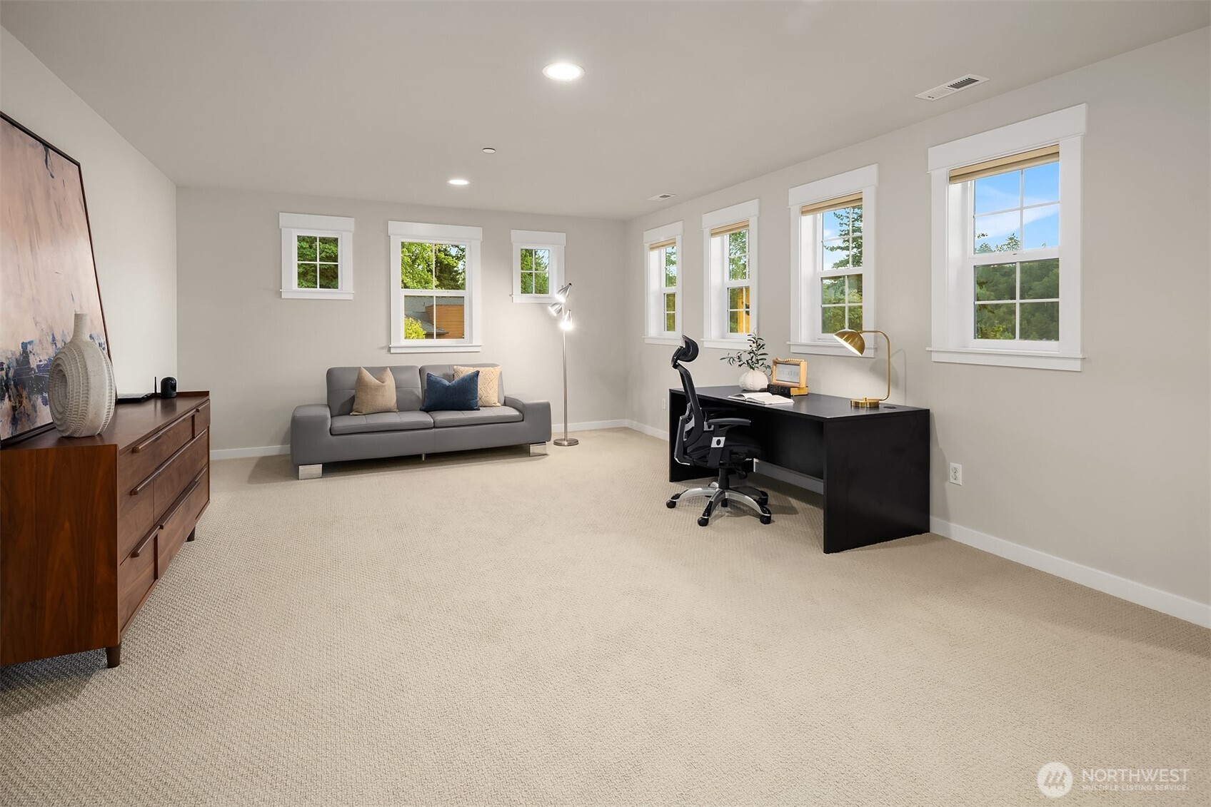 9934 Northeast 162nd Street Bothell, WA 98011 - Photo 19 of 40 a living room with furniture and a large window