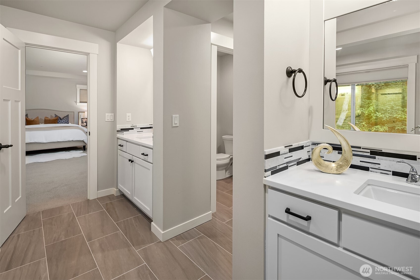 9934 Northeast 162nd Street Bothell, WA 98011 - Photo 28 of 40 a bathroom with a sink and a mirror