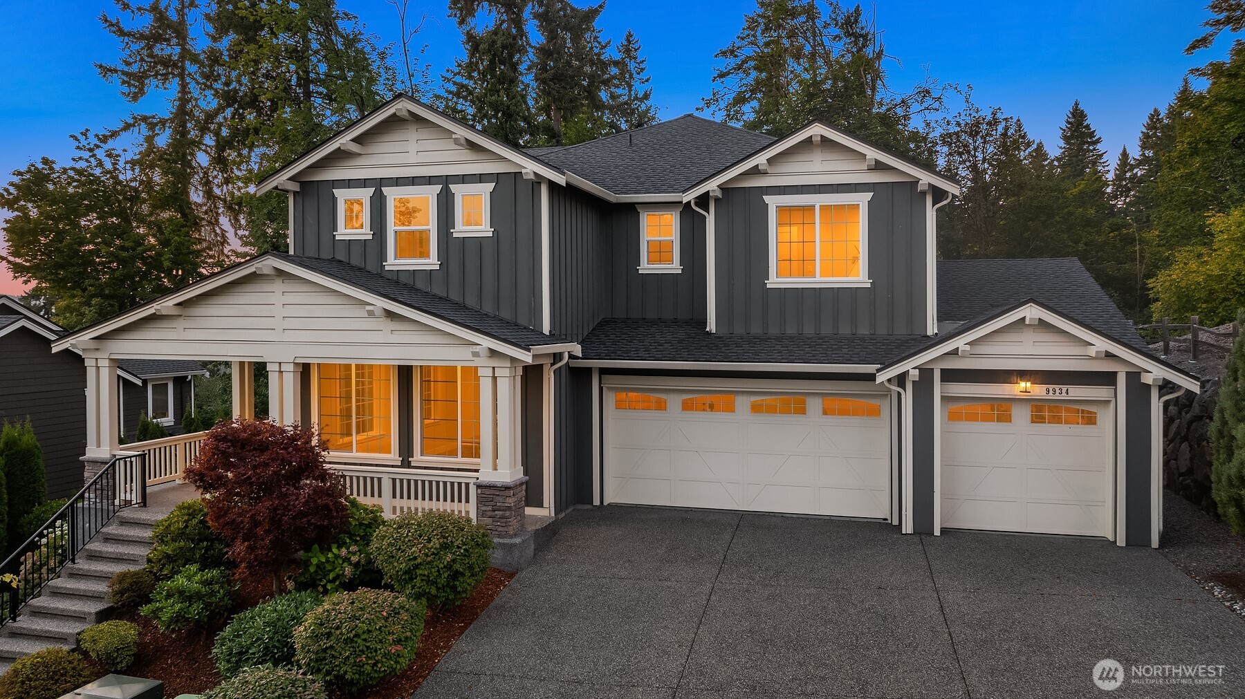 9934 Northeast 162nd Street Bothell, WA 98011 - Photo 35 of 40 a front view of a house with yard