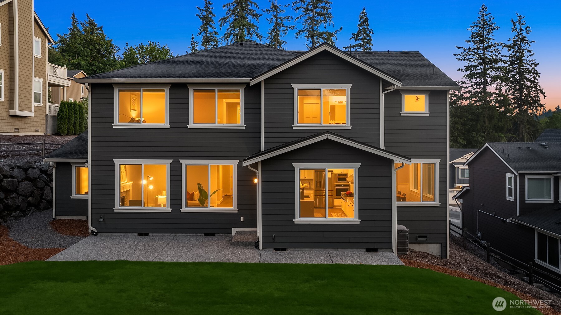 9934 Northeast 162nd Street Bothell, WA 98011 - Photo 37 of 40 a front view of a house with a yard