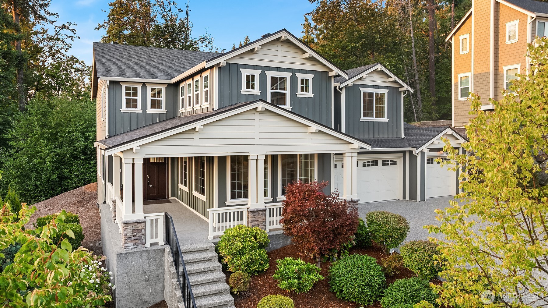 9934 Northeast 162nd Street Bothell, WA 98011 - Photo 38 of 40 a front view of a house with garden